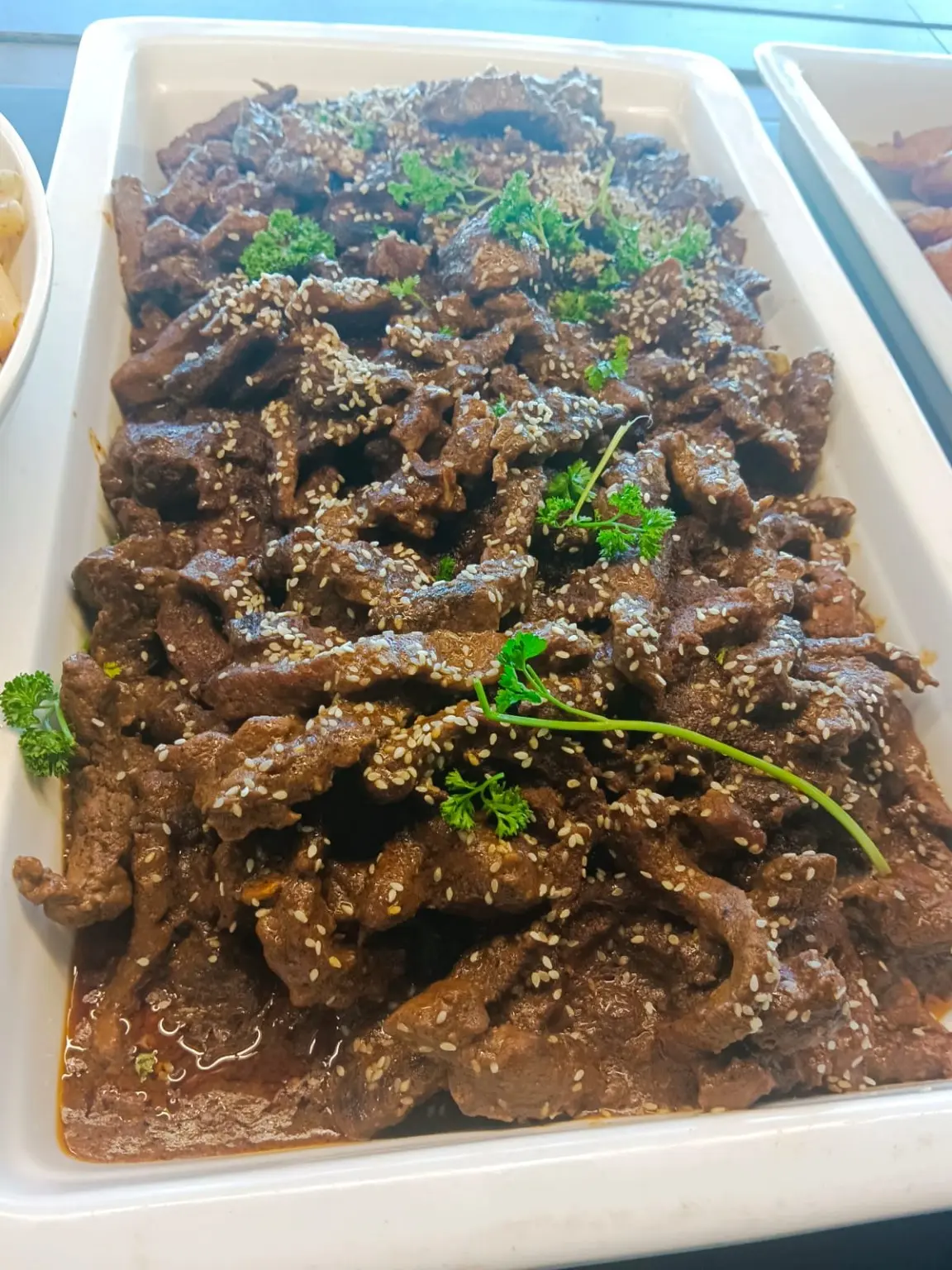 Braised beef prepared for buffet service