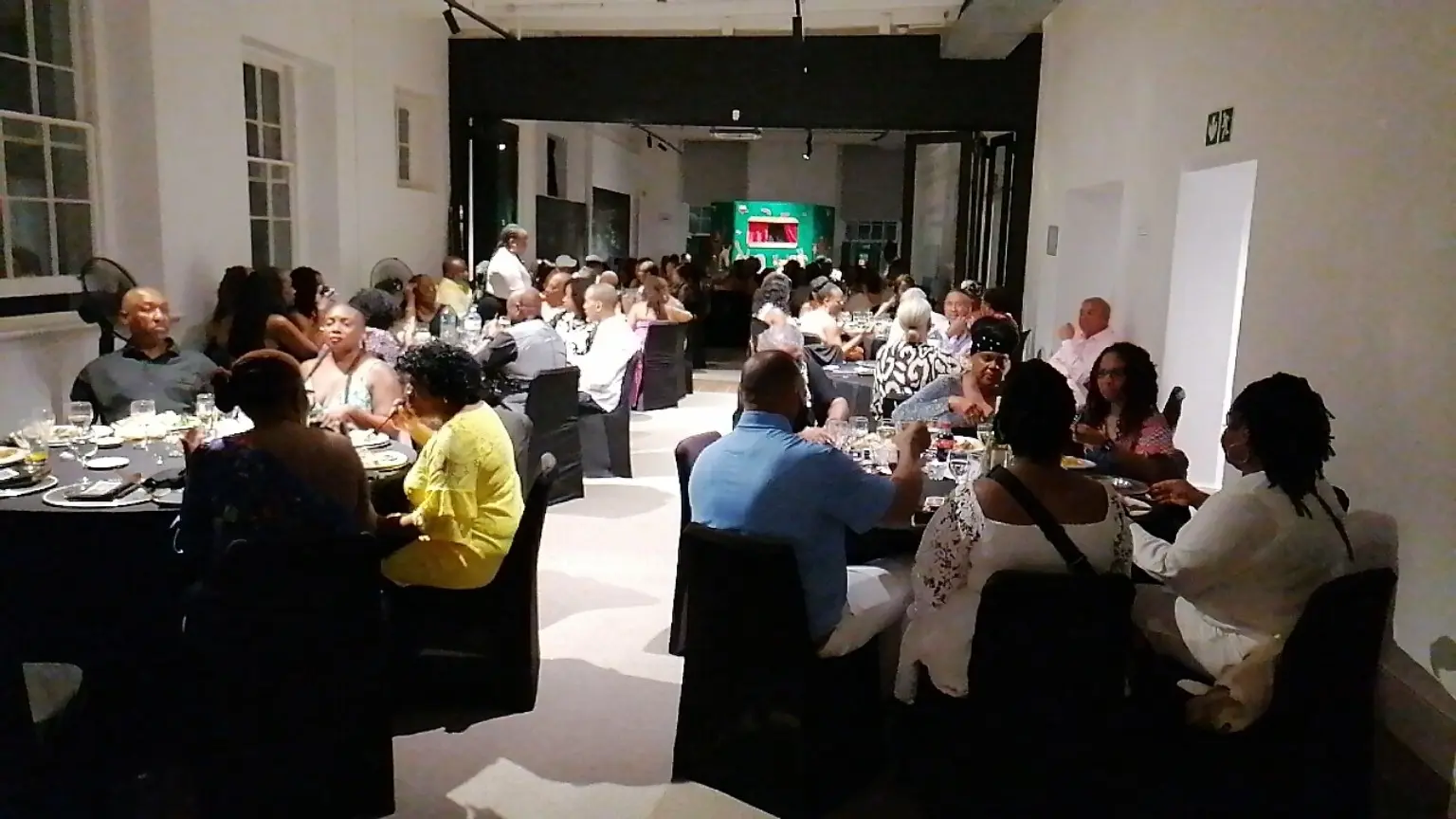 Guests seated at a catered corporate dining event