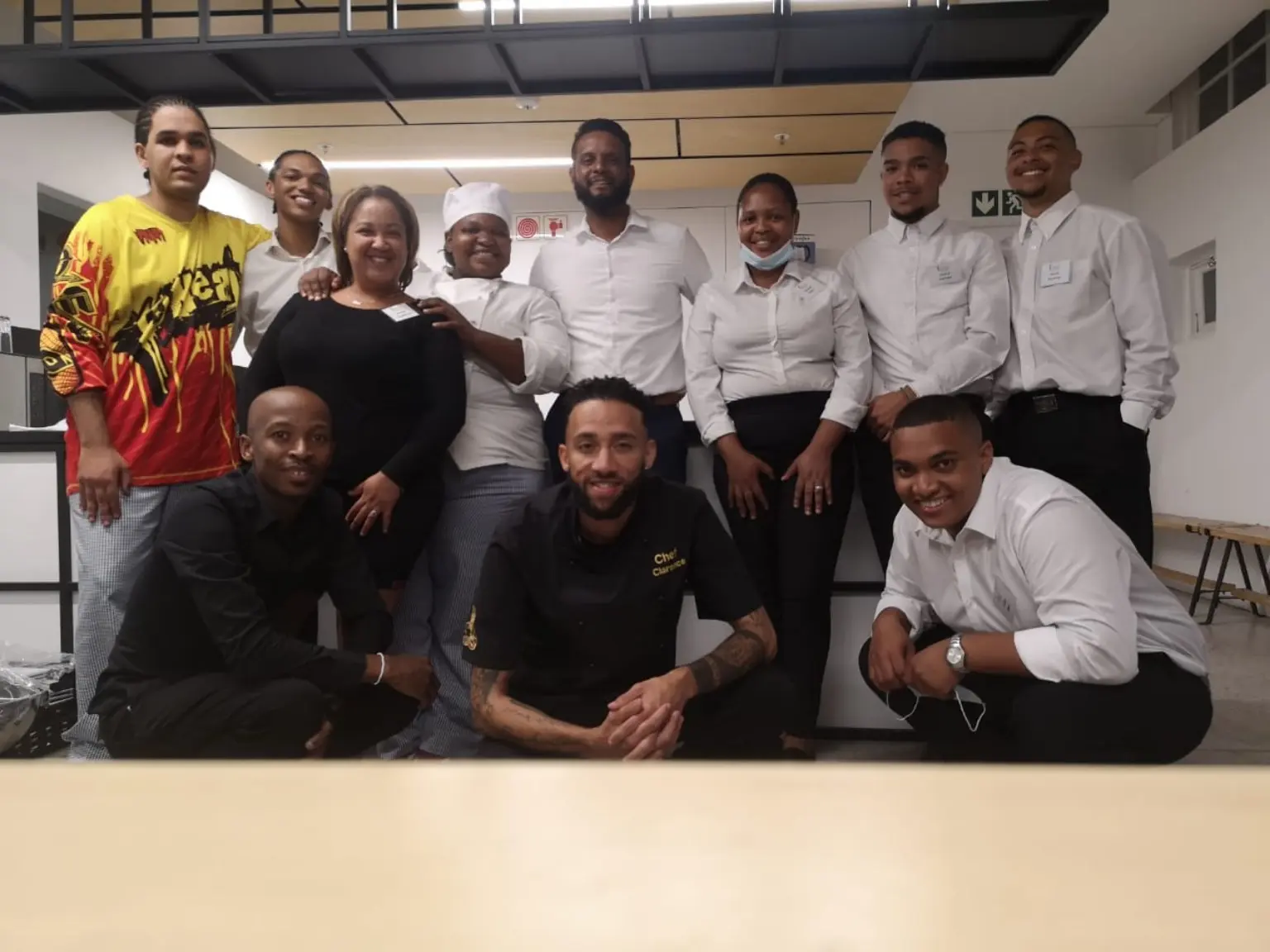 Hospitality team gathered after a successful service